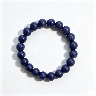 A handmade prayer bead bracelet made from natural, aromatic herbal beads; a unisex scented accessory for meditation and everyday wear