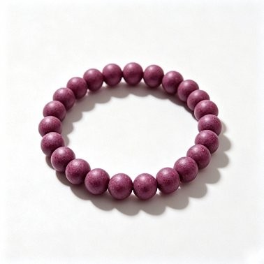 A handmade prayer bead bracelet made from natural, aromatic herbal beads; a unisex scented accessory for meditation and everyday wear