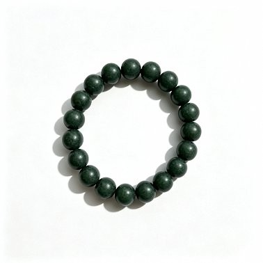 A handmade prayer bead bracelet made from natural, aromatic herbal beads; a unisex scented accessory for meditation and everyday wear